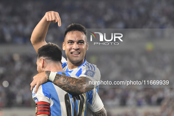 Lionel Messi and Lautaro Martinez celebrate their team's second goal during a match between Argentina and Bolivia at Estadio Mas Monumental...