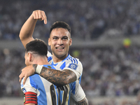 Lionel Messi and Lautaro Martinez celebrate their team's second goal during a match between Argentina and Bolivia at Estadio Mas Monumental...