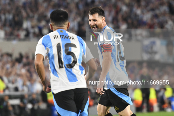 Lionel Messi celebrates his second goal of the night with Thiago Almada during a match between Argentina and Bolivia at Estadio Mas Monument...