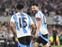 Lionel Messi celebrates his second goal of the night with Thiago Almada during a match between Argentina and Bolivia at Estadio Mas Monument...