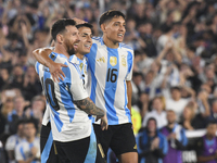 Lionel Messi celebrates his second goal of the night with Thiago Almada and Nahuel Molina during a match between Argentina and Bolivia at Es...