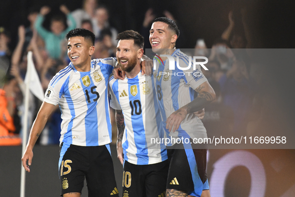 Lionel Messi of Argentina celebrates his third goal of the night with Thiago Almada and Enzo Fernandez during a match between Argentina and...