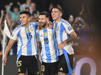 Lionel Messi of Argentina celebrates his third goal of the night with Thiago Almada and Enzo Fernandez during a match between Argentina and...