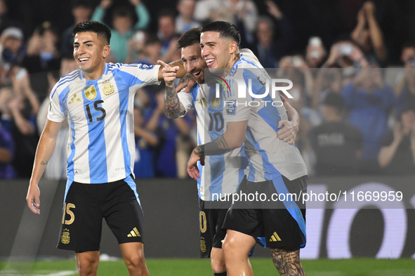 Lionel Messi of Argentina celebrates his third goal of the night with Thiago Almada and Enzo Fernandez during a match between Argentina and...