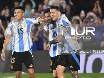 Lionel Messi of Argentina celebrates his third goal of the night with Thiago Almada and Enzo Fernandez during a match between Argentina and...