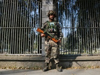 An Indian Paramilitary Soldier stands guard as Jammu and Kashmir and National Conference (NC) Vice President Omar Abdullah arrives to take t...