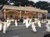 Artists perform during the West Bengal government-organized Puja Carnival for a procession of award-winning idols of Hindu Goddess Durga, ma...