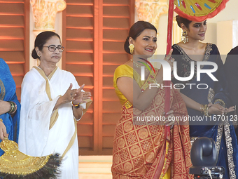 West Bengal Chief Minister Mamata Banerjee, along with actress and her party MP Rachana Banerjee, June Malaya, and others, participates in t...