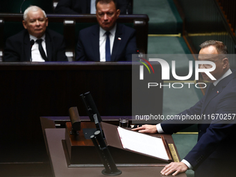 Polish President Andrzej Duda speaks as Law and Justice party leader Jaroslaw Kaczynski and Mariusz Blaszczak listen during the Polish Parli...