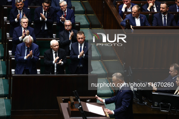 Law and Justice party leader Jaroslaw Kaczynski, Mariusz Blaszczak, Polish Prime Minister Donald Tusk and Polish Minister of Defence Wladysl...