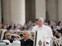 Pope Francis arrives in St. Peter's Square at the Vatican on October 16, 2024, for the weekly general audience. (