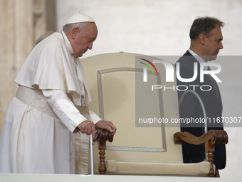 Pope Francis arrives in St. Peter's Square at the Vatican on October 16, 2024, for the weekly general audience. (