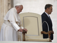 Pope Francis arrives in St. Peter's Square at the Vatican on October 16, 2024, for the weekly general audience. (