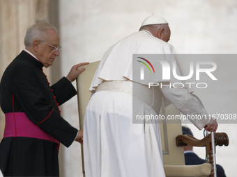 Pope Francis arrives in St. Peter's Square at the Vatican on October 16, 2024, for the weekly general audience. (