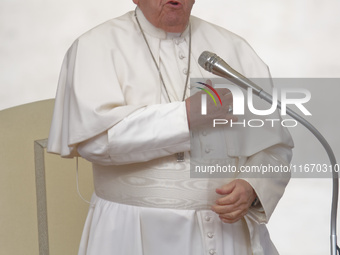 Pope Francis arrives in St. Peter's Square at the Vatican on October 16, 2024, for the weekly general audience. (