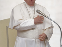 Pope Francis arrives in St. Peter's Square at the Vatican on October 16, 2024, for the weekly general audience. (