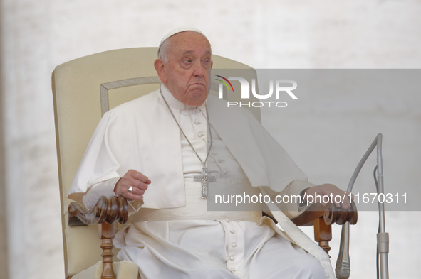 Pope Francis arrives in St. Peter's Square at the Vatican on October 16, 2024, for the weekly general audience. 