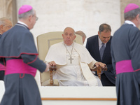 Pope Francis looks on during the weekly general audience at Saint Peter's Square in The Vatican on October 16, 2024. (