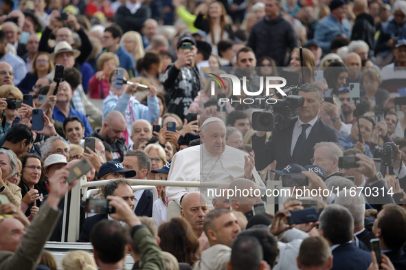 Pope Francis holds his weekly general audience in St. Peter's Square, at the Vatican, on October 16, 2024. 