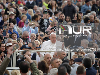 Pope Francis holds his weekly general audience in St. Peter's Square, at the Vatican, on October 16, 2024. (