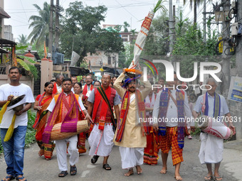 Devotees take part in a religious rally on the occasion of Lakshmi Puja in Beltola, Guwahati, India, on October 16, 2024. Laxmi is one of th...