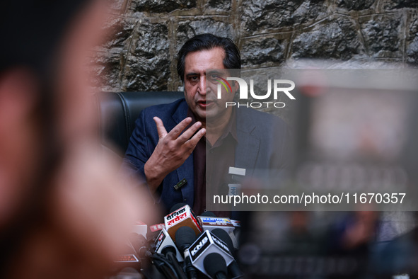 People's Conference President Sajad Gani Lone, along with Imran Reza Ansari, addresses media persons after Omar Abdullah takes the oath as C...