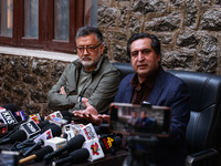 People's Conference President Sajad Gani Lone, along with Imran Reza Ansari, addresses media persons after Omar Abdullah takes the oath as C...