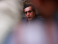 People's Conference President Sajad Gani Lone, along with Imran Reza Ansari, addresses media persons after Omar Abdullah takes the oath as C...