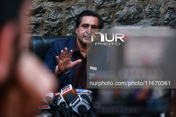 People's Conference President Sajad Gani Lone, along with Imran Reza Ansari, addresses media persons after Omar Abdullah takes the oath as C...