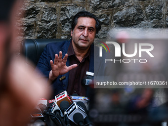 People's Conference President Sajad Gani Lone, along with Imran Reza Ansari, addresses media persons after Omar Abdullah takes the oath as C...