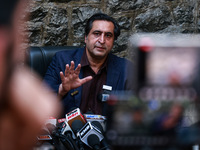 People's Conference President Sajad Gani Lone, along with Imran Reza Ansari, addresses media persons after Omar Abdullah takes the oath as C...