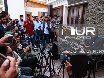 People's Conference President Sajad Gani Lone, along with Imran Reza Ansari, addresses media persons after Omar Abdullah takes the oath as C...