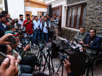 People's Conference President Sajad Gani Lone, along with Imran Reza Ansari, addresses media persons after Omar Abdullah takes the oath as C...