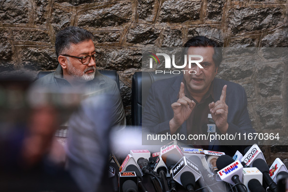 People's Conference President Sajad Gani Lone, along with Imran Reza Ansari, addresses media persons after Omar Abdullah takes the oath as C...