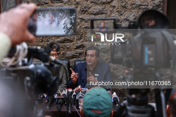 People's Conference President Sajad Gani Lone, along with Imran Reza Ansari, addresses media persons after Omar Abdullah takes the oath as C...