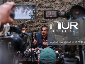 People's Conference President Sajad Gani Lone, along with Imran Reza Ansari, addresses media persons after Omar Abdullah takes the oath as C...