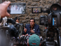 People's Conference President Sajad Gani Lone, along with Imran Reza Ansari, addresses media persons after Omar Abdullah takes the oath as C...