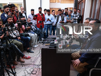 People's Conference President Sajad Gani Lone, along with Imran Reza Ansari, addresses media persons after Omar Abdullah takes the oath as C...