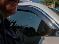 National Conference (NC) Vice President Omar Abdullah leaves in his vehicle after taking the oath as Jammu and Kashmir's Chief Minister in S...