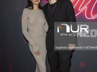 Ava Maria and Anton Bitter attend the ''Anora'' New York premiere at Regal Times Square in New York, USA, on October 15, 2024. (