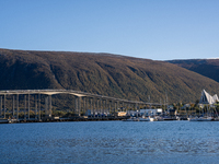 A view of the Tromso Bridge and the Arctic Cathedral (R) in Tromso, Norway on September 25, 2024. Tromso is the biggest city in Northern Nor...