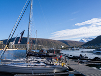 A view of the harbor of Tromso with the Tromsdalstinden mountain in background in Tromso, Norway on September 25, 2024. Tromso is the bigges...