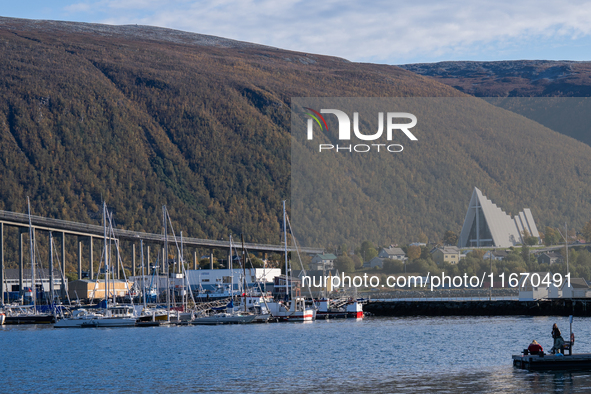 A view of the Tromso Bridge and the Arctic Cathedral (R) in Tromso, Norway on September 25, 2024. Tromso is the biggest city in Northern Nor...