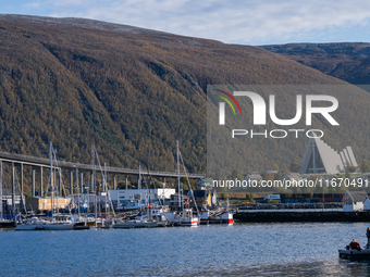 A view of the Tromso Bridge and the Arctic Cathedral (R) in Tromso, Norway on September 25, 2024. Tromso is the biggest city in Northern Nor...