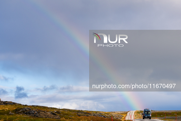 A rainbow stretches across the sky over the E69 road leading to Nordkapp, Norway, on September 27, 2024.  The European route E69 motorway en...