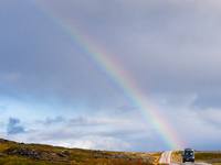 A rainbow stretches across the sky over the E69 road leading to Nordkapp, Norway, on September 27, 2024.  The European route E69 motorway en...