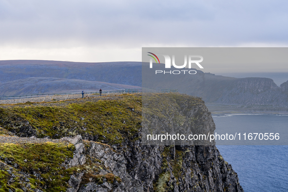 Tourists in North Cape, Norway,  on September 27, 2024. Nordkapp or North Cape is considered the northernmost point in Europe and one of the...