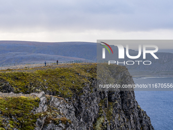 Tourists in North Cape, Norway,  on September 27, 2024. Nordkapp or North Cape is considered the northernmost point in Europe and one of the...