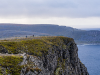 Tourists in North Cape, Norway,  on September 27, 2024. Nordkapp or North Cape is considered the northernmost point in Europe and one of the...