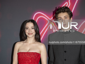 Mikey Madison and Mark Eydelshteyn attend the ''Anora'' New York premiere at Regal Times Square in New York, USA, on October 15, 2024. (